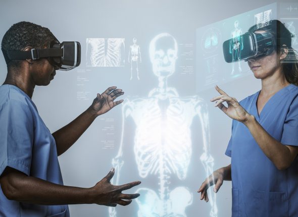Doctors wearing VR simulation with hologram medical technology